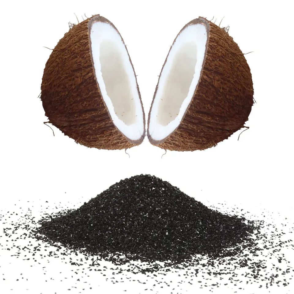 A halved coconut resting above a pile of dark activated-carbon granules